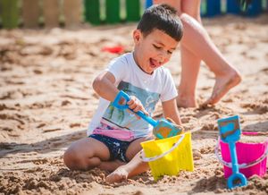 Children play at the Farmarama beach party