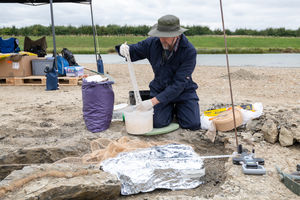 Nigel Larkin works on putting a plaster jacket on part of the Ichthyosaur skeleton found at Rutland Water Nature Reserve. Picture: Anglian Water