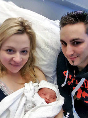 Natalie Taylor and Richard Jones with newborn leapling Reece Jones