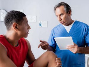 A man talking to a medic
