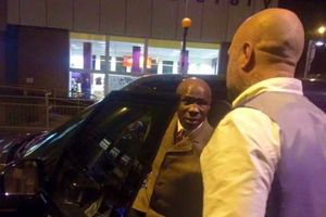 Chris Eubank emerges from one of the firm's cars