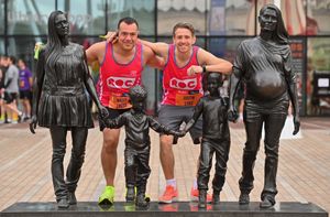 Brett Ellis from Birmingham and Justin Hodge from Halesowen, posed near the 'Real Birmingham Family' statue