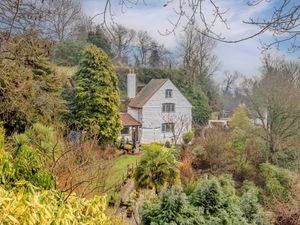 Supporting image for story: Inside the incredible 16th century West Midlands cottage built in a carved out cave and up for sale with a hot tub and aga - price here