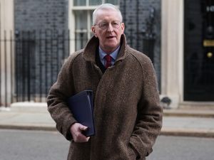 Northern Ireland Secretary Hilary Benn arrives in Downing Street for a Cabinet meeting