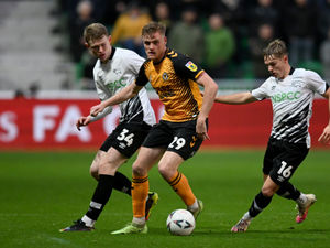 Supporting image for story: Mid Wales' Will Evans flying Cymru Premier flag and making mark for Newport County