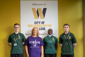 Suzanne Richards MBE with students enrolled on uniformed public services courses.