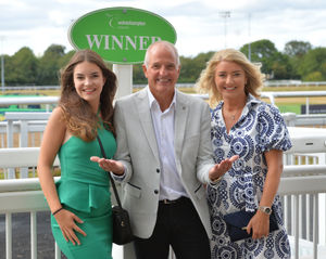 Wolves legend Steve Bull with his daughter Gracie and wife Kirsty