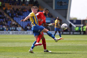 Josh Daniels of Shrewsbury Town and Jordan Cousins of Wigan Athletic (AMA)