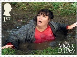 A stamp showing an unsuspecting Geraldine jumping into a very deep puddle