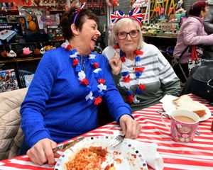 Chris Bayfield and Eve Whapples enjoy the 1940s food and drink on offer