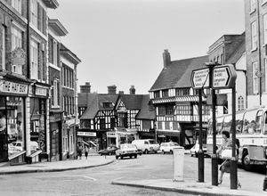 Wyle Cop, Shrewsbury, in 1980, with visible stores including on the left The Hat Box, and The Wool Shop. Shrewsbury street scene, general view. 
