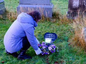 Supporting image for story: Final residents of historic close honoured with grave marker after 100 years