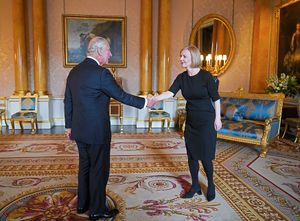King Charles III shakes hands with PM Liz Truss at Buckingham Palace
