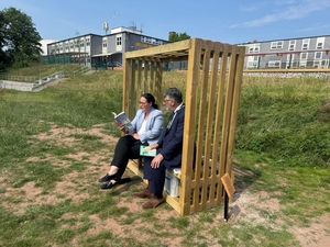 Marc Jordan, right, and Principal Rachael Sandham, left, look out over the newly landscaped area.