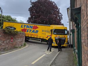 Supporting image for story: Lorry blocks Bishop's Castle street after becoming wedged between two houses