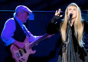 FILE - This March 19, 2009 file photo shows John McVie, left, and Stevie Nicks of Fleetwood Mac performing at Madison Square Garden in New York. Fleetwood Mac is heading back on the road with a 34-city U.S. tour kicking off April 3, 2013 in Columbus, Ohio. (AP Photo/Charles Sykes, file)