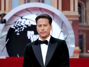 Supporting image for story: No Time To Die director says Bond film was always intended for the big screen