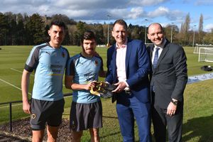 Danny Batth and Ruben Neves, with winner Lee Waterfall and fellow Wolves fan Peter Smith-Round, who shares the Billy Wright Executive Box.