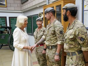 Supporting image for story: Queen presented with brooch to mark dedication to Army battalion