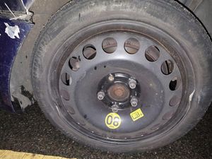 Damage near a front tyre on the car. Photo: Brierley Hill Police