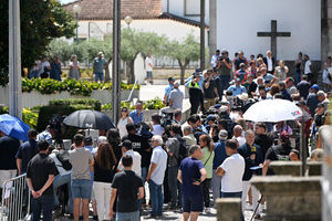 Members of the media and public gather at the wake of Diogo Jota being held at Sao Cosme Chapel in the town of Gondomar near Porto