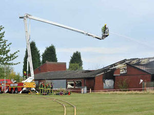 Supporting image for story: School is destroyed in arson attack