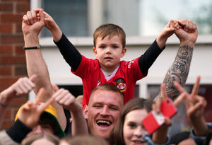 Wrexham fans during a victory parade in Wrexham