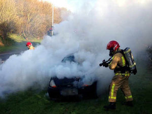 Supporting image for story: PICTURED: Firefighters tackle blazing car on busy Telford road