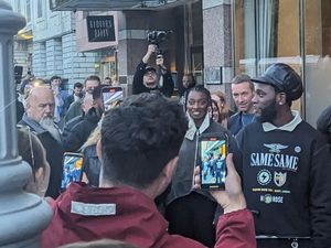 Supporting image for story: Coldplay and friends deliver surprise performance for fans in Dublin street