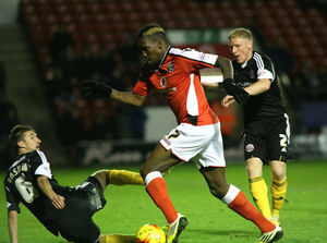 Mathieu Manset with Chris Basham (6) and Craig Alcock of Sheffield United