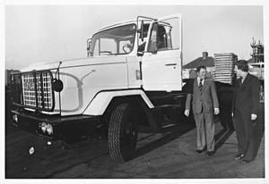 Guy Motors, Ltd., Park Lane, Fallings Park, Wolverhampton. The first of new super-tough Landtrain trucks, specially designed for the Middle and Far East, Africa and Latin America, being inspected by Jimmy Johnson and Brian Jones.