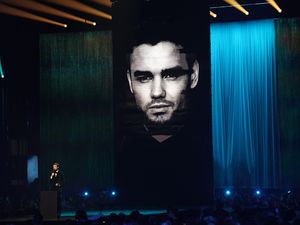 A video montage in memory of Liam Payne is played during the Brit Awards