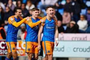 Iwan Morgan celebrates after equalising for Shrewsbury just before half-time.