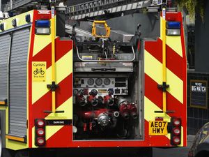 Supporting image for story: Two escape as helicopter catches fire in West Midlands emergency landing