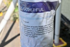 The planning application is visible outside the pub