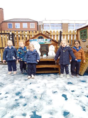 Little Trinity Nursery children enjoying a spot of snowy fun!