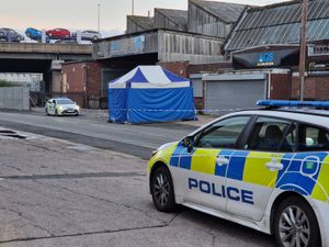 A blue police investigation tent was spotted at the scene where a 19-year-old woman was found dead