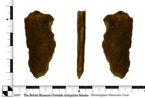 A fragment of a copper alloy blade fragment,  Credit PAS Cymru – National Museum Wales