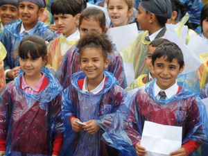 Supporting image for story: Singing in the rain! Children perform in Wolverhampton - in pictures and video