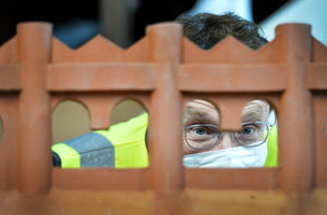 Andy Street examines tiles at Hinton Perry & Davenhill Ltd, Dreadnought Rd, Brierley Hill