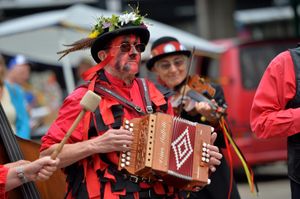 SHREW COPYRIGHT SHROPSHIRE STAR STEVE LEATH 25/07/2021..Pic in Shrewsbury Town Centre, where as part of the 'Miles of Smiles' event, there were various cultural events happening around the town. Here in the Square, The Ironmen and Severn Gildres perform..