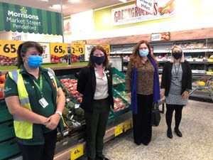 Supporting image for story: MP visits supermarket to learn about community work