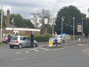Supporting image for story: Queues after driver crashes into traffic light barrier in Telford