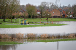 The burst banks of the River Penk from Radford Bridge in Stafford
