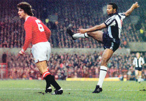 Cyrille Regis in action against Manchester United.