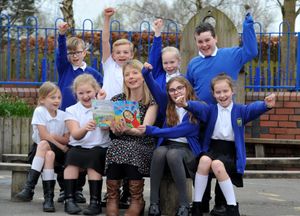 Sarah Griffiths with pupils at Ladygrove Primary School 
