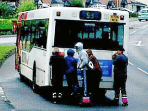 Supporting image for story: Rollerskate boys who were towed along in traffic must clean buses