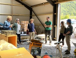 Councillor Jeremy Brignell-Thorp (third right), Powys County Council’s Cabinet Assistant for the Climate Emergency, visits the shared tool store and packing shed at Sarn