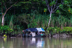 An army checkpoint on the river San Juan looks on