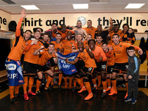 Supporting image for story: 'We are going up!' Wolves players celebrate promotion after derby win - VIDEO